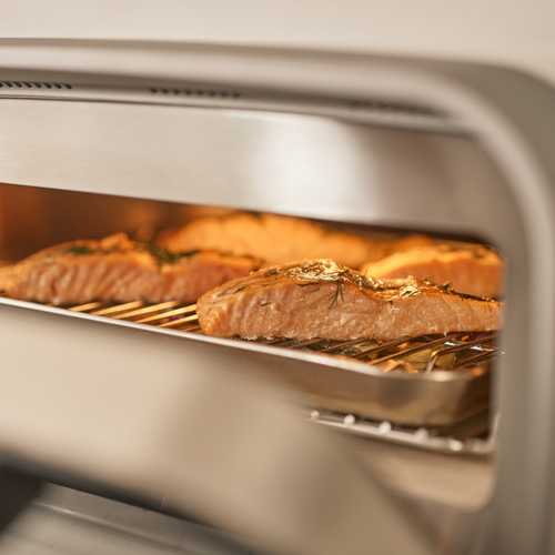 Salmon fillets cooking in the Ooni Volt 2