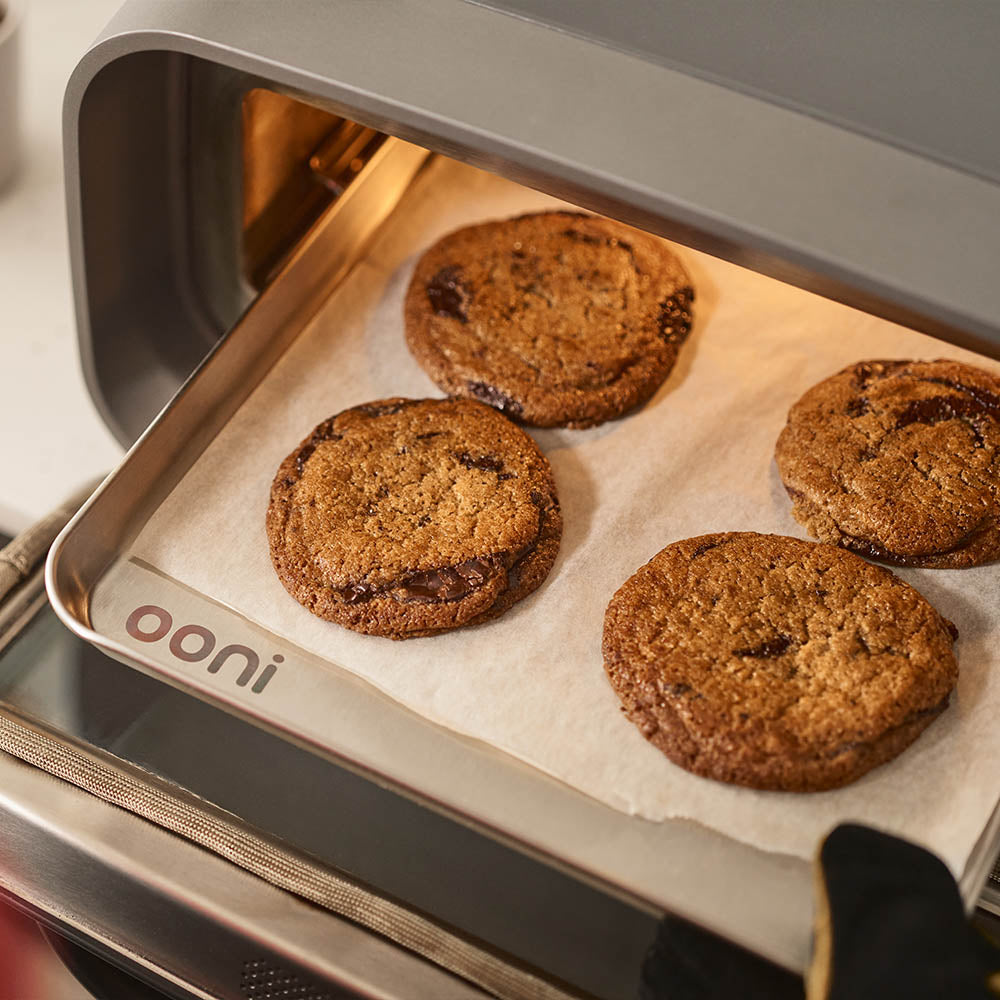 A tray of cookies baking in a Ooni Volt 2 oven