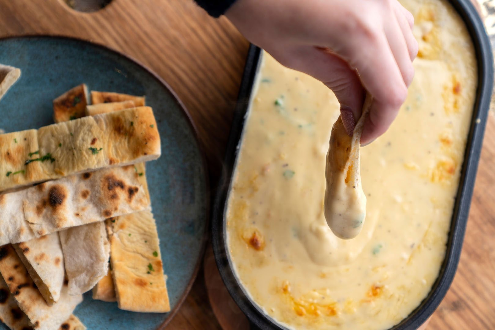 Baked Herby Cheese Fondue Recipe — Ooni Europe