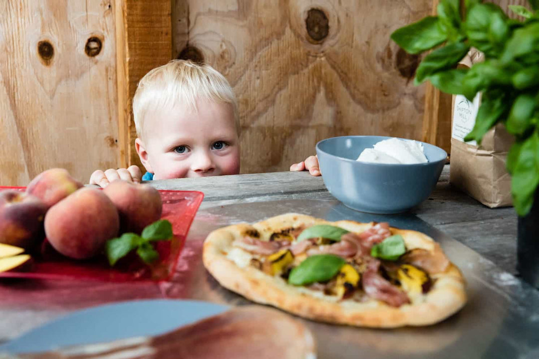 Otto stares at pizza