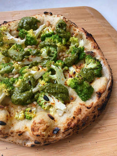 Romanesco Pizza with Cashew Cream, Salsa Verde and Pine Nuts