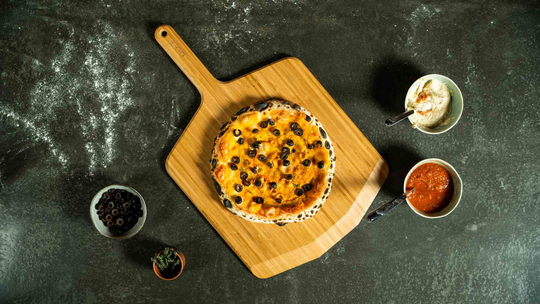 The Vegan Hum-Bo: Hummus and Black Olive Pizza 
