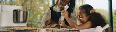 A Mother and daughter baked cookies using the Ooni Halo Pro Mixer