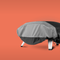 The Koda 2 Max pizza oven bundle on an orange background