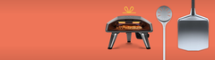 The Ooni Koda 2 oven, turning peel and metal peel on an orange background