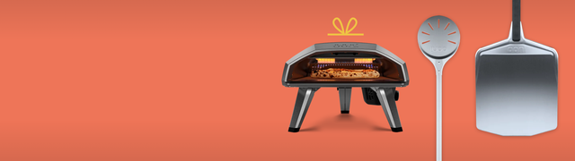 The Ooni Koda 2 oven, turning peel and metal peel on an orange background