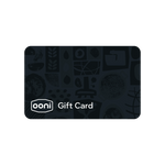 A dark charcoal gray Ooni gift card with a subtle pattern of culinary and kitchen-themed illustrations, featuring the white 'ooni' logo and 'Gift Card' text near the bottom left, shown on a plain white background.