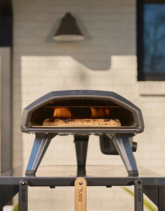 The Koda 2 oven with a cooking pizza inside