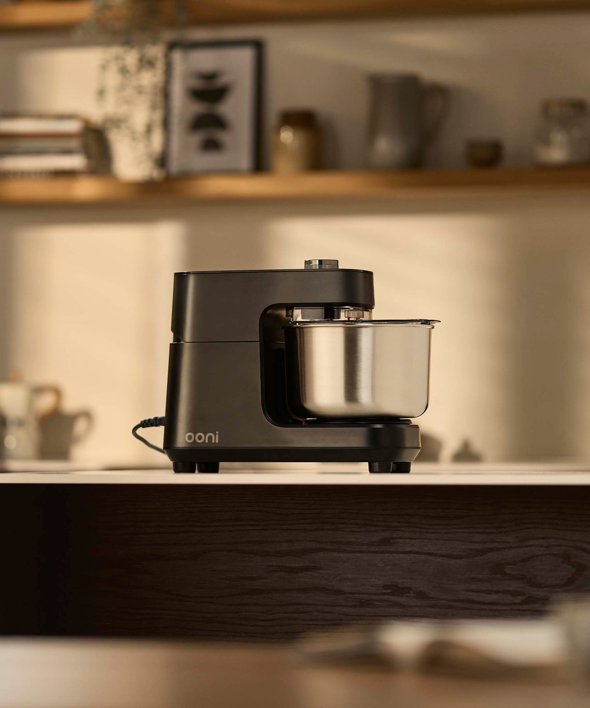 The Ooni Halo Core spiral mixer on a kitchen counter