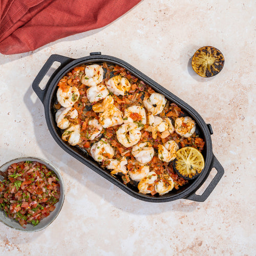 Cast Iron Sizzler Pan with roasted shrimp