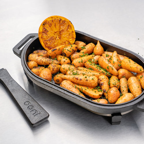 Cast Iron Sizzler Pan with roasted carrots