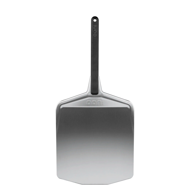 Ooni metal pizza peel with a handle on a white background